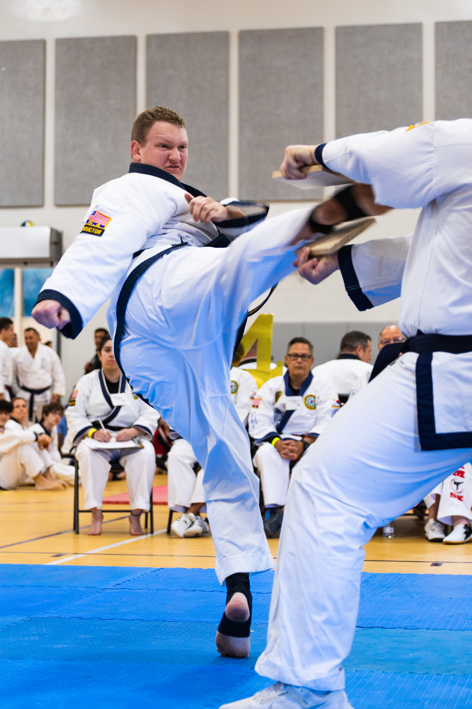 Instructor kicking board
