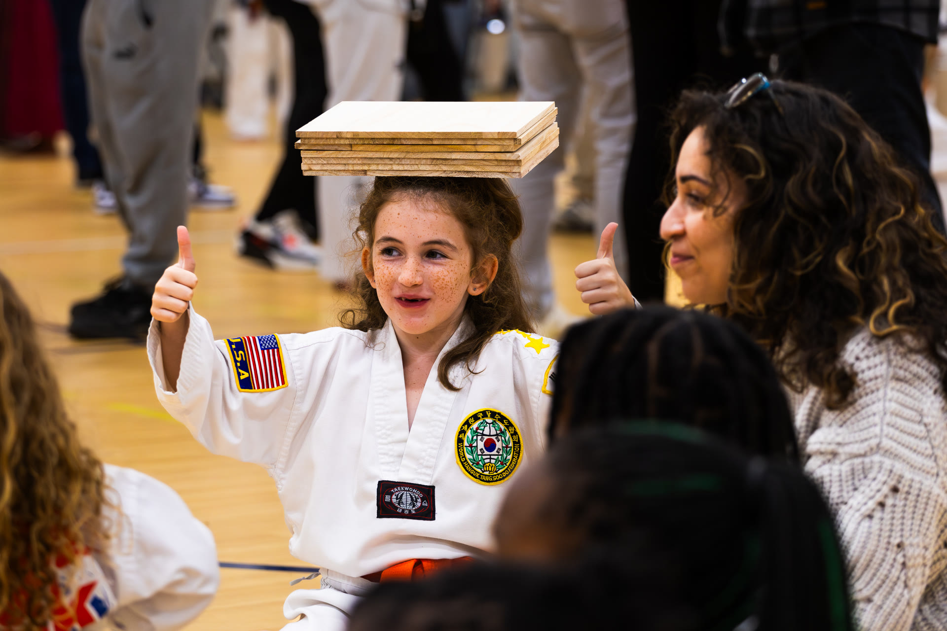 Students with breaking boards