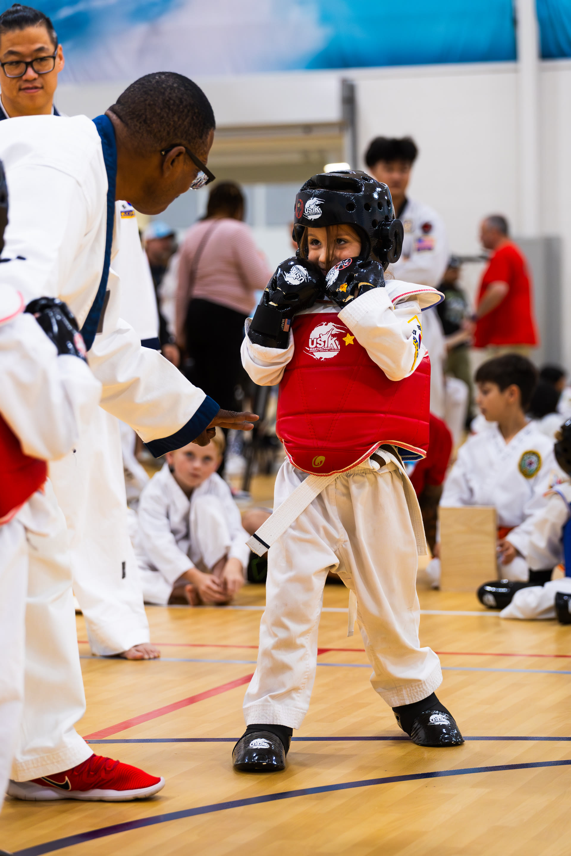 Young competitor in sparring gear